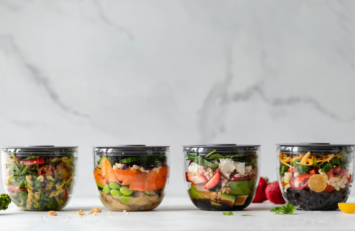 Nutritionist reviewing meal plan components with healthy ingredients